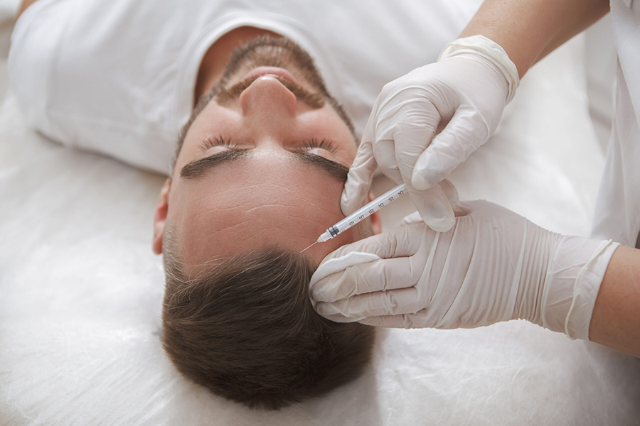 Man receiving PRP Platelet Rich Plasma